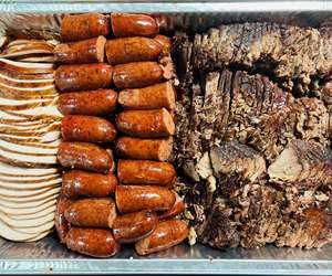 platter of turkey, sausage and brisket